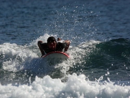 Surfing at El Medano South Bay