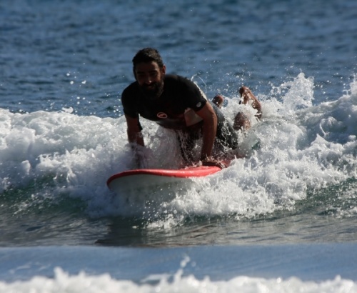 Surfing at El Medano South Bay