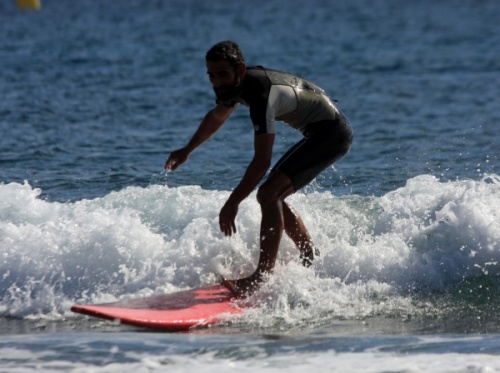 Surfing at El Medano South Bay