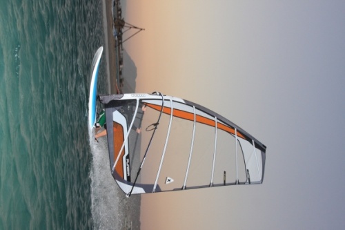 Windsurfing at evening and dusk